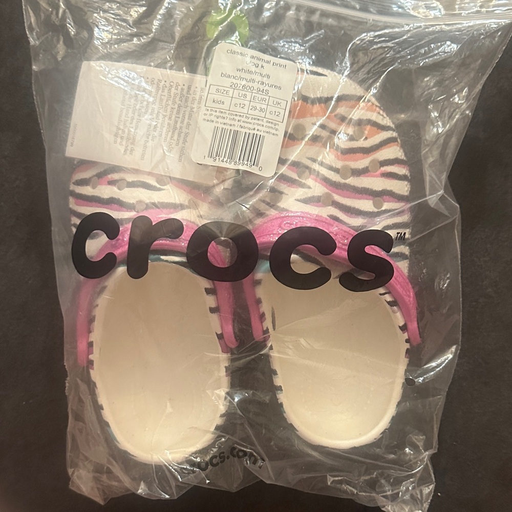 CROCS Zebra Pattern Clogs with Pink Highlights